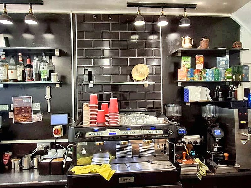 The espresso machine behind the counter