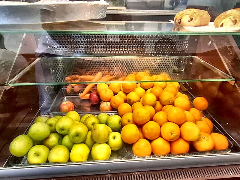 Apples and oranges ready for the juicer