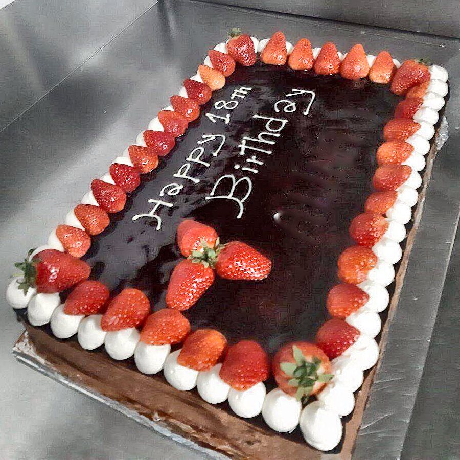 A strawberry and chocolate "Happy 18th Birthday" cake made in the Cafe Royal kitchen